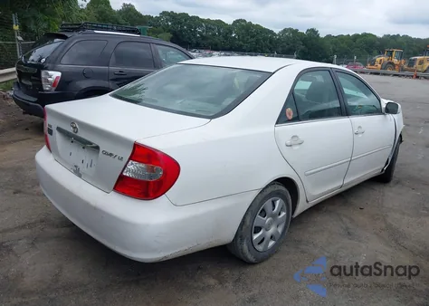 2003 Toyota Camry Le z USA, uszkodzony, nr VIN 4T1BE32KX3U223732